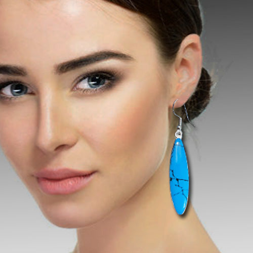 Turquoise dangle silver earrings.