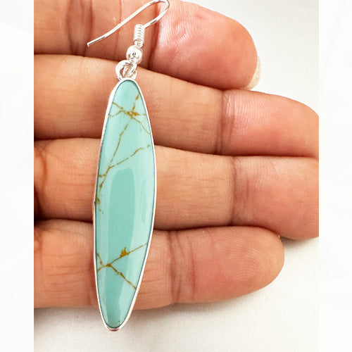 Light Turquoise dangle silver earrings.