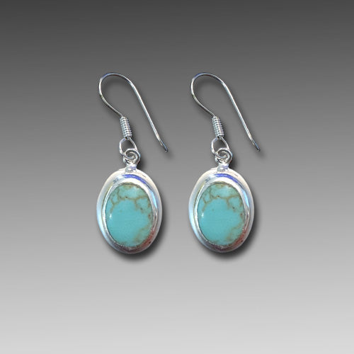 Turquoise Oval dangle silver earrings.