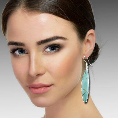 Light Turquoise dangle silver earrings.