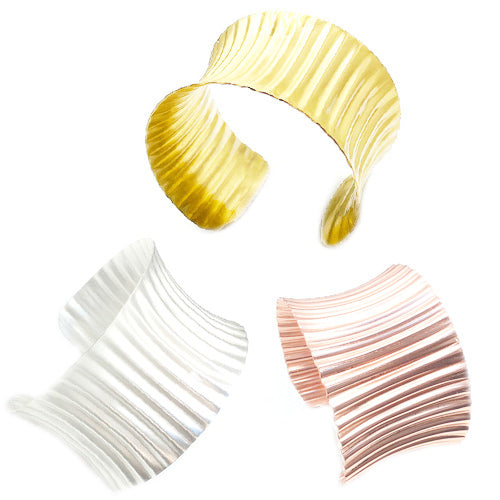CORRUGATED COPPER ANTICLASTIC CUFF.