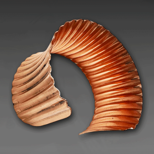 CORRUGATED COPPER ANTICLASTIC CUFF.